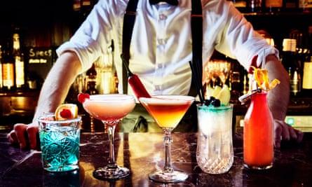A stylised and very colourful shot of five different cocktails on the counter at Marble Bar in Sydney, Australia.